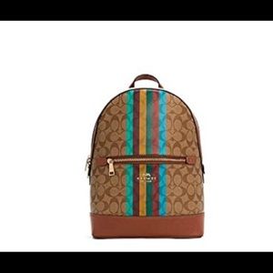 Coach Kenley Backpack in Signature Canvas w/Stripes
Signature coated canvas